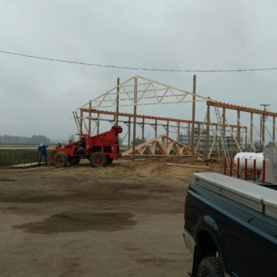 The frame begins to take shape and the first truss is secured into position!