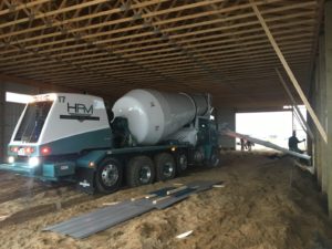 Taking advantage of the mild weather to lay some concrete for Alt Oil Company's new building!