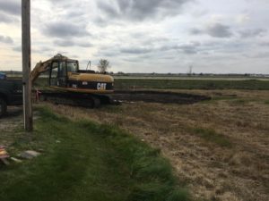 Site ground prep work underway for the new building at Alt Oil Company in Coopersville, MI.